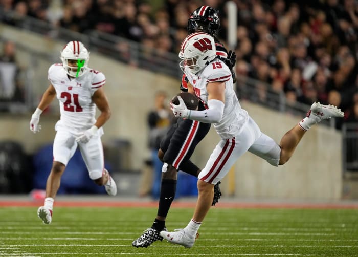 Wisconsin safety John Torchio intercepting a pass against Ohio State
